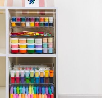 A close-up image of colorful, well-organized craft supplies