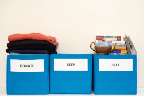 Boxes labeled "donate", "keep" and "sell".