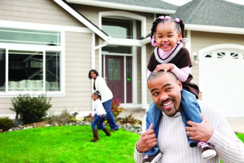 father with a daughter on his shoulders