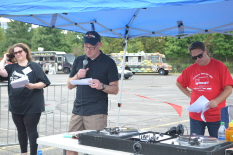 DJ Booth at Bekins Truck Pull for GKTW and Move For Hunger