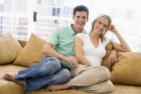 Couple on Sofa Happy