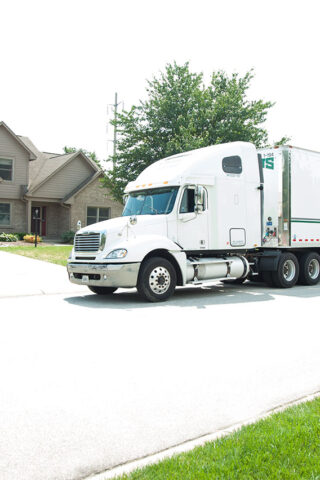 bekins moving truck outside home