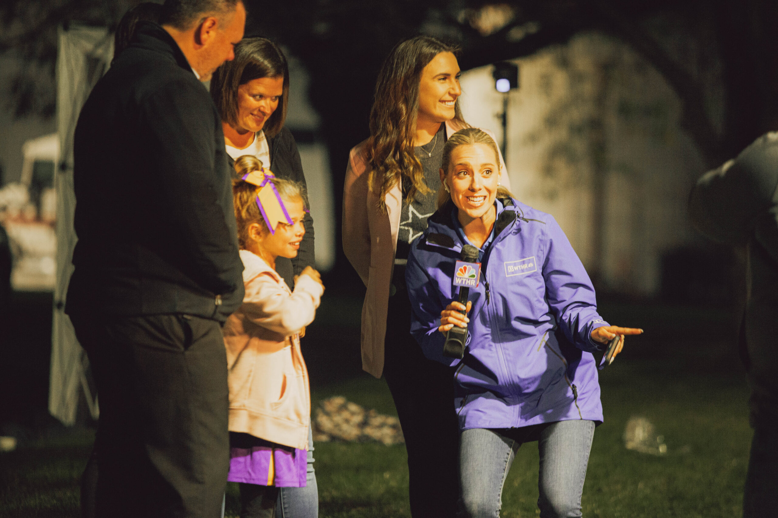 GKTW alumni family speaks to WTHR reporter Samantha Johnson about their experience to publicize truck pull fundraiser