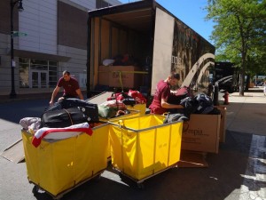 Olympia-sorting-and-loading-the-athletes-luggage-