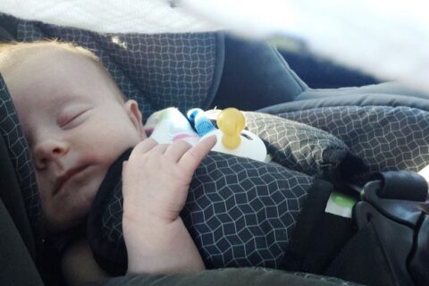 Sleeping baby in carseat