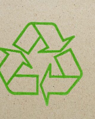 Recycling logo on brown paper