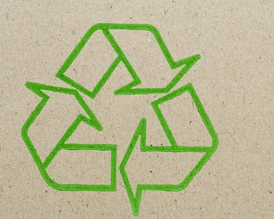 Recycling logo on brown paper