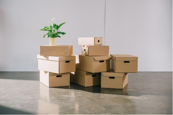 boxes stacked up in nearly empty office.