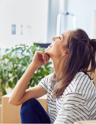 woman unpacking new office space