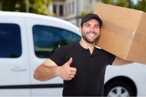 Mover giving thumbs up while a box inside