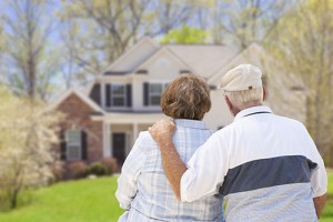 senior couple looking at a home