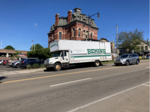 Bekins truck outside of building.